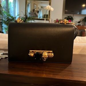 Black and gold Alexander McQueen handbag like new